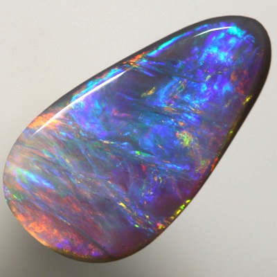 SOLID SEMI BLACK OPAL Bright golds to turquoise and blue